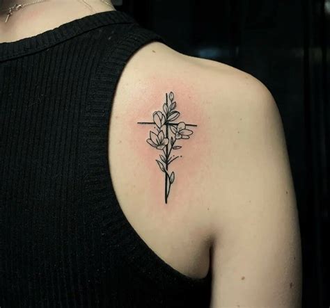 11 Feminine Cross With Flowers Tattoo Ideas That Will Blow Your Mind 11 Feminine Cross With Flowers Tattoo Ideas That Will Blow Your Mind