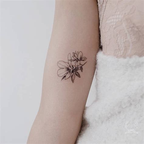 15 Of The Smallest Most Tasteful Flower Tattoos