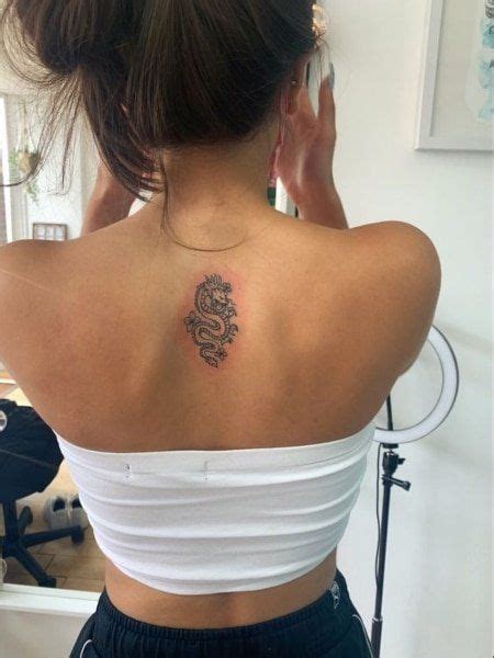 25 Coolest Back Tattoos For Women Small Back Tattoos Tattoos For Women Discreet Tattoos