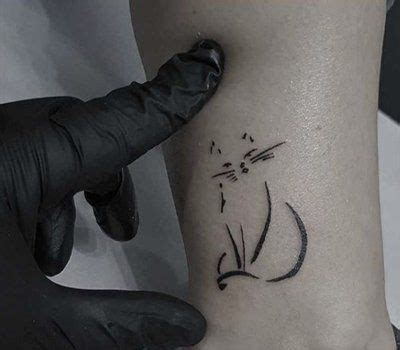 25 Inspiring Kitty Tattoo Designs For Cat Lovers 25 Inspiring Kitty Tattoo Designs For Cat Lovers