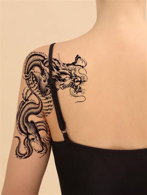 27 Dragon Shoulder Tattoo Stock Photos High Res Pictures And Images Getty Images 27 Dragon Shoulder Tattoo Stock Photos High Res Pictures And Images Getty Images