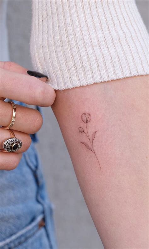 30 Beautiful Flower Tattoo Ideas Tulip Tattoo I Take You Haircuts Hairstyles Hair Colours