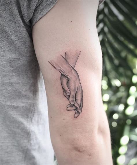 30 Great Holding Hands Tattoos You Will Love Hand Tattoos Tattoos Tattoo You