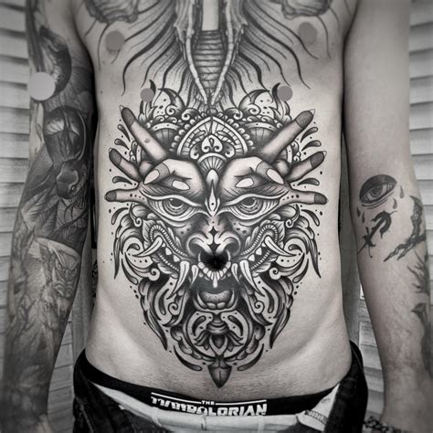 31 Captivating Stomach Tattoos For Men In 2024