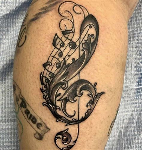 32 Cool Music Note Tattoo Ideas Music Notes Tattoo Music Note Tattoo Music Tattoo Designs