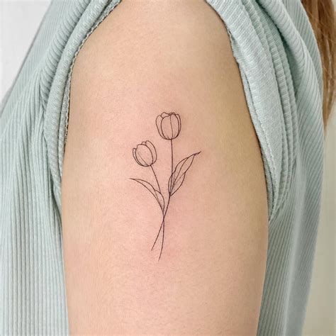 7 Tulip Tattoo Ideas Tulip Tattoo Discreet Tattoos Subtle Tattoos