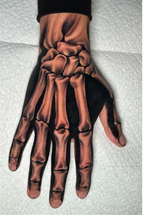 73 Cool Skeleton Hand Tattoo Designs For Men 73 Cool Skeleton Hand Tattoo Designs For Men