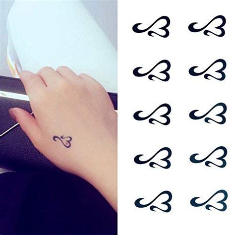 Amazon Com Oottati Small Cute Temporary Tattoo Heart Totem Hand Set Of 2 Beauty Personal Care