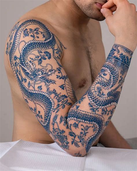Beautiful Dragon Neck Tattoo By The Amazing Oozy Tattoo For More Tattoos Like This Be Sure To Check Out Their Page Tattoo Dragontattoo Blueinktattoo Necktattoo Tattooartist Tattooideas Tattooart