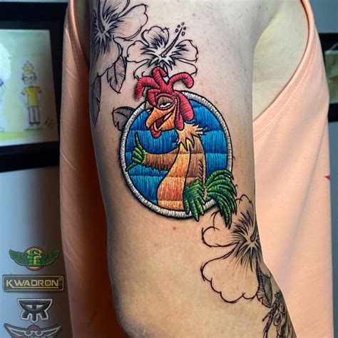 Chicken Joe From Surf S Up Tattooed On The Upper Arm