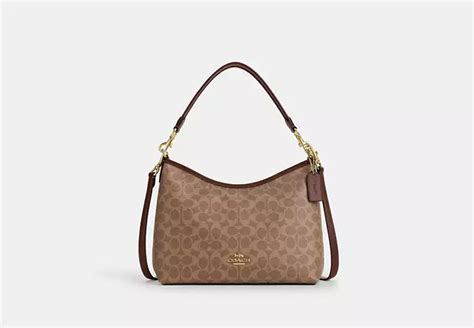 Coach Cv975 Laurel Shoulder Bag In Signature Canvas Gold White Chalk Coach Handbags