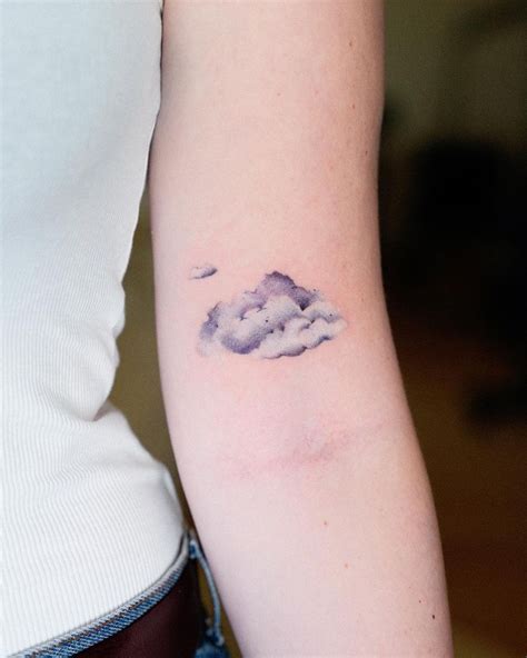 Cute Cloud On Arm Cloud Tattoo Cloud Tattoo Design Elbow Tattoos