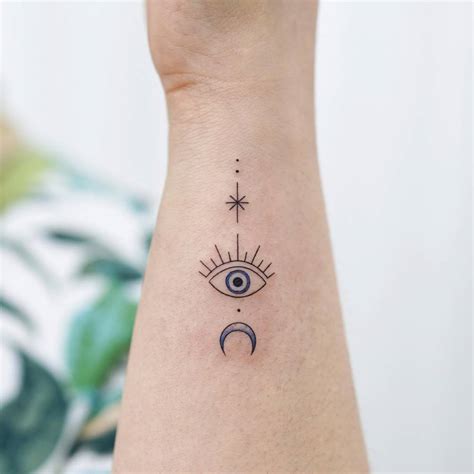 Evil Eye Wrist Tattoos 18 Unique Evil Eye Tattoo Designs For Charm And