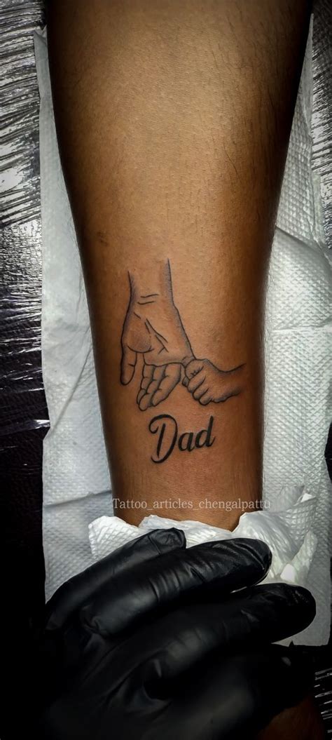 Father S Love Inked Forever This Small Dad Son Hand Tattoo Is A Symbol Of Unbreakable Bond Protection And Pure Emotion Minimal Meaningful And Perfect For Those Who Want A Subtle Reminder Of Love Father S Love Inked Forever This Small Dad Son Hand Tattoo Is A Symbol Of Unbreakable Bond Protection And Pure Emotion Minimal Meaningful And Perfect For Those Who Want A Subtle Reminder Of Love