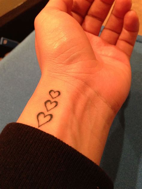 Heart Hand Tattoo Designs