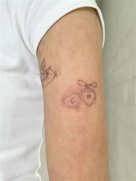 Heart Locket Tattoo With Initials Locket Tattoos Intimate Tattoos Discreet Tattoos