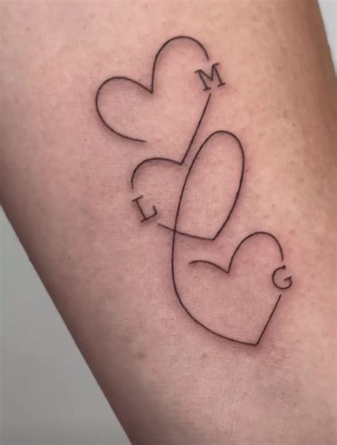 Hearts Tattoo Little Tattoos Matching Bound By Ink And Intertwined Destinies Three Friends Forever Connected Through The Art Of Siblings Tattoo Tattoo Tattoosutra Siblinggoals Friendshipgoals Couplegoals Coupletattoos Tripletattoo