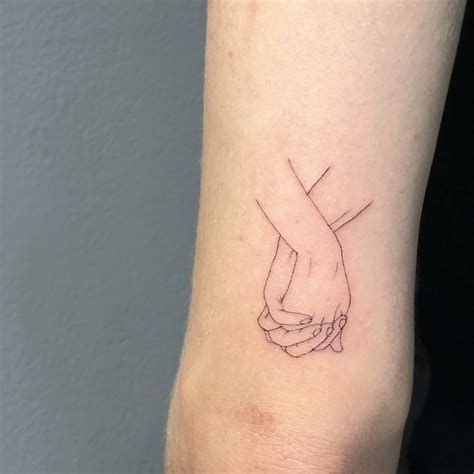 Holding Hands Tattoo Meaning