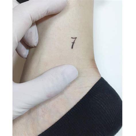 Minimalistic Number 7 Tattoo Located On The Ankle
