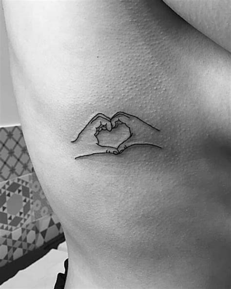 Pin By Kristina Beale On Tattoos Hand Heart Tattoo Tattoos For Daughters Small Tattoos