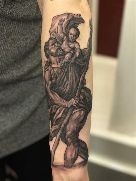 Saint Christopher Tattoo By Lauren Fred Inkd Blackandgrey Blackandgreytattoo Forearmtattoos Armtattoo Saintchristophertattoo Saintchristopher Saintchristophermedals Bemyguide Medalliontattoo Patronsaint Religioustattoos