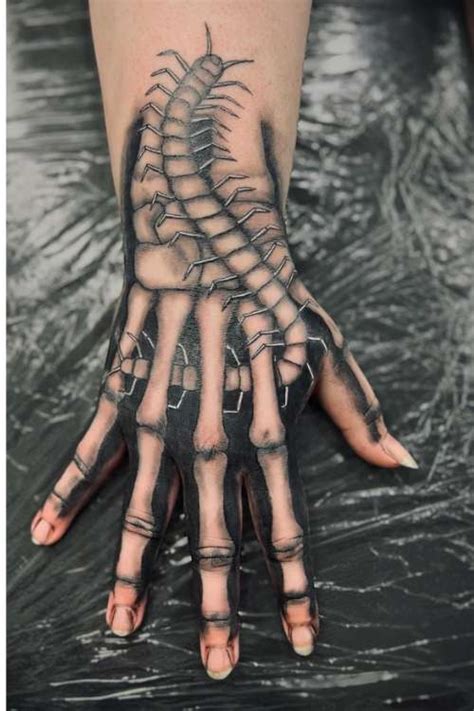 Skeleton Hand Tattoo Tattoo Ideas And Inspiration