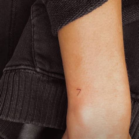 Small Number 7 Tattoo Located On Alyssa Lynch S
