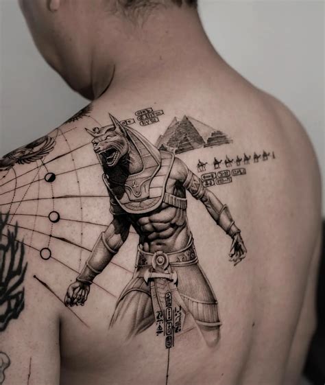 Where Myth Meets Ink This Anubis Tattoo With The Pyramids Captures The Power Mystery And Timeless Spirit Of Ancient Egypt Crafted With Precision At Hani Studio In Hurghada A Piece Of