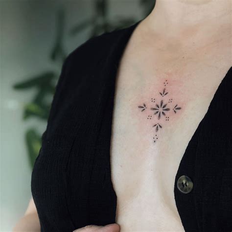Small Women Chest Tattoo Designs